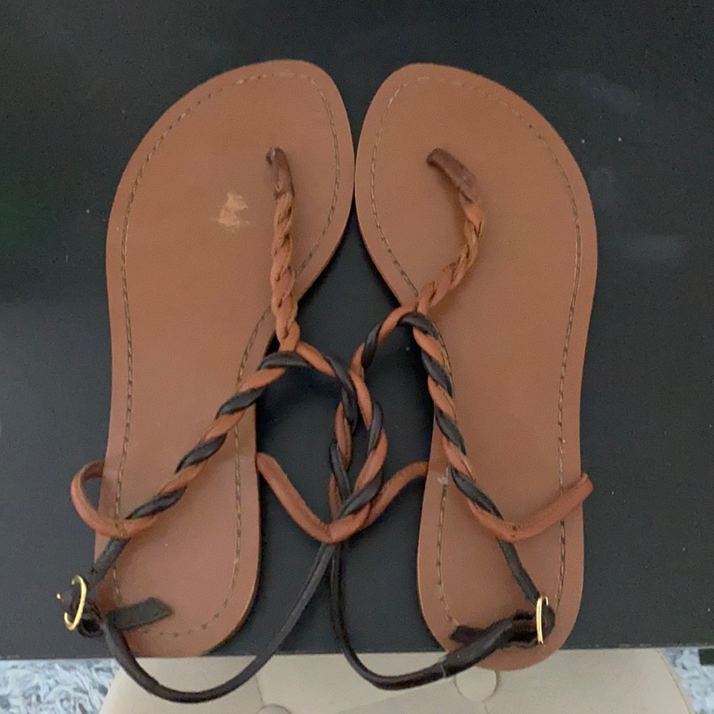Tan and black sandals